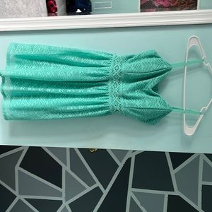 color is blueish green, no flaws, worn a couple of times